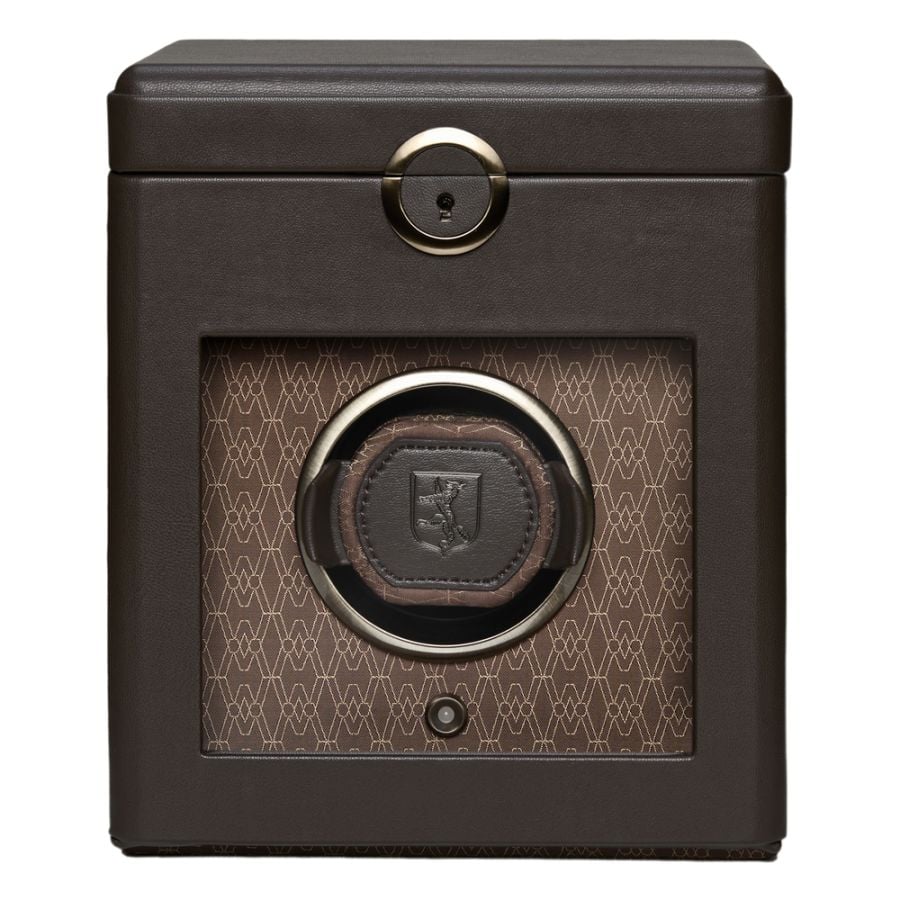 Front view of a closed brown leather automatic watch winder box.