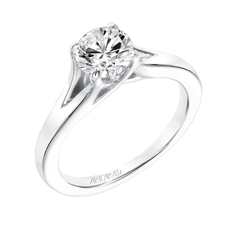 Tilted View Of Classic Solitaire Engagement Ring.