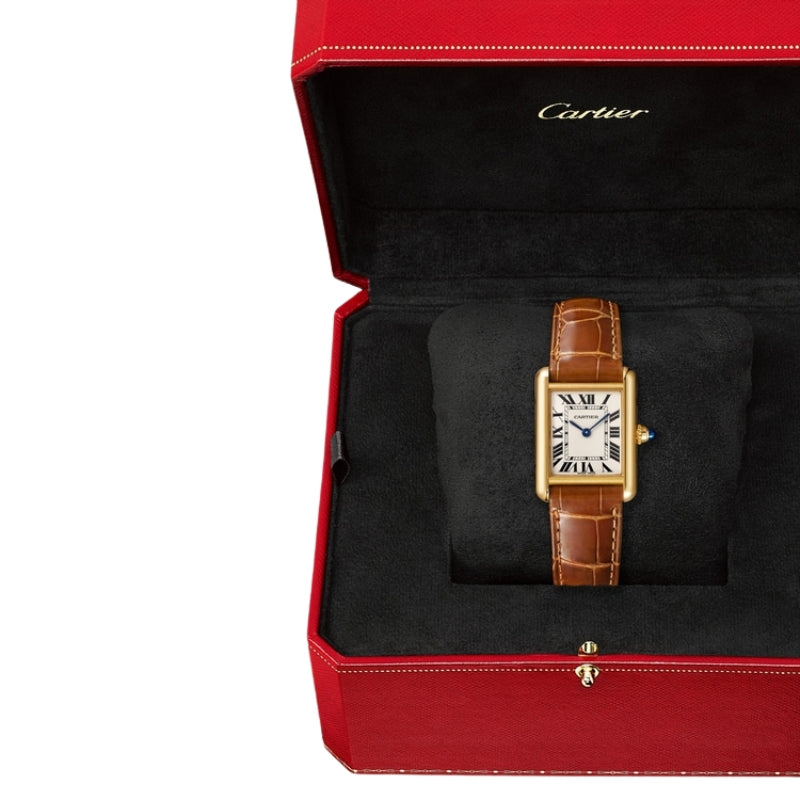 Luxury Cartier watch inside a red presentation box.