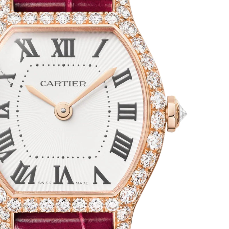 Dial view of Tortue Cartier watch with rose gold diamond bezel.