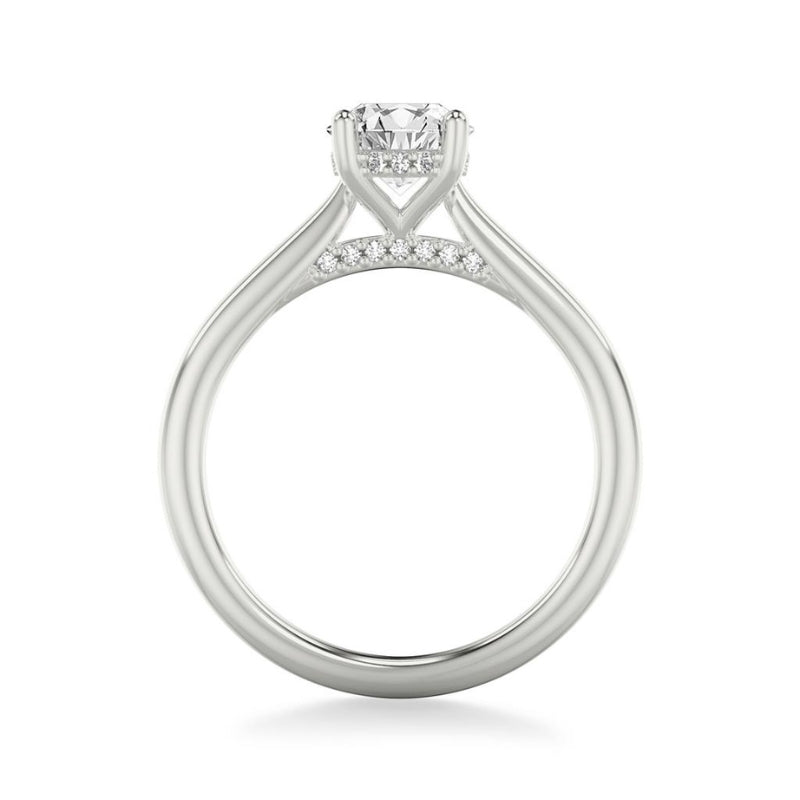 Side View Of Emerald Classic Solitaire Engagement Ring with Hidden Diamond Halo.