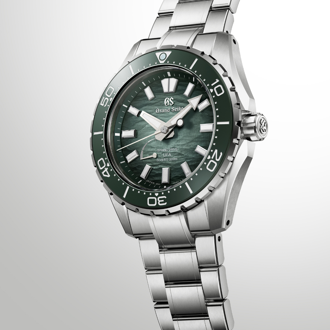 High-fashion studio shot of the watch with dramatic lighting and soft shadows.