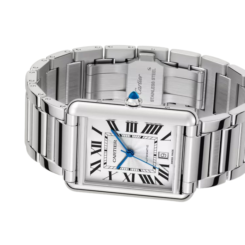 Angled shot of silver watch and open clasp.