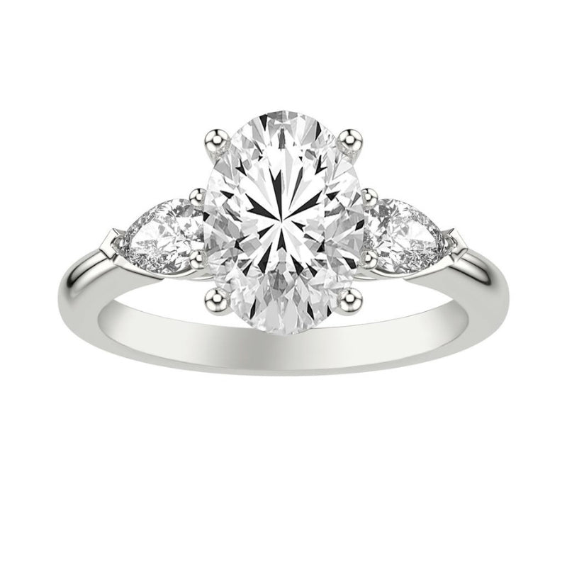 Front View Of Oval Three-Stone Engagement Ring with 1/2 CTW Pear Sides.