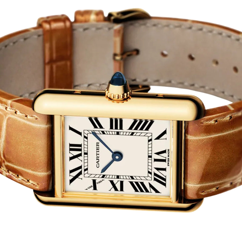 Angled view of a gold Cartier automatic watch.