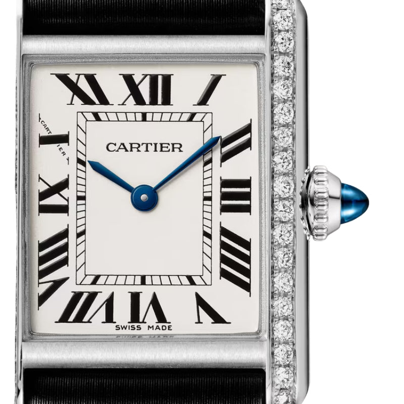 Close-up of diamond-set Cartier Tank watch face.