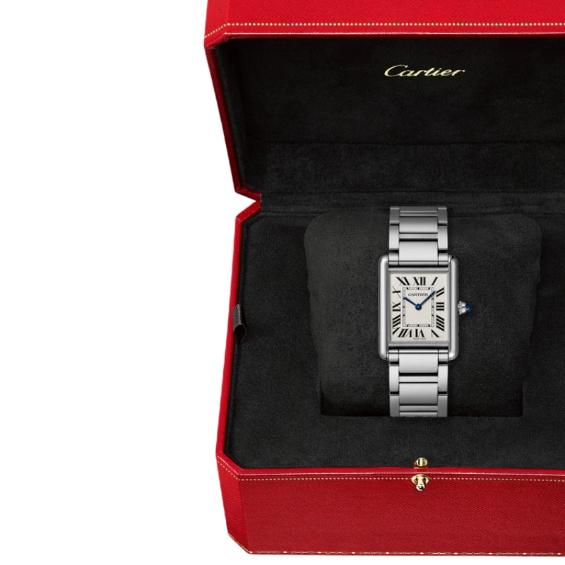 Silver watch displayed inside a red luxury box.