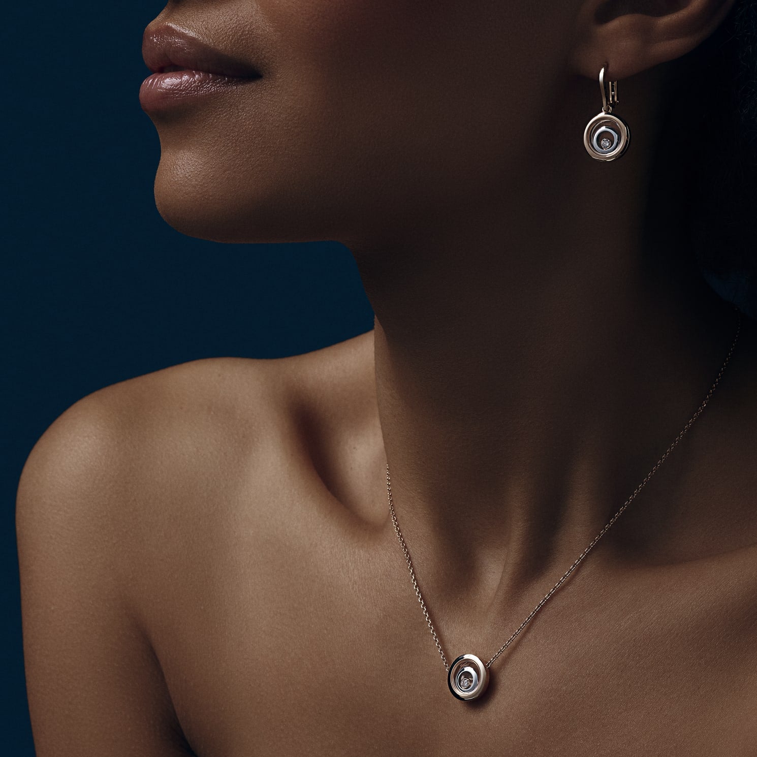 model wearing Happy Spirit Rose and White Gold Necklace and earring