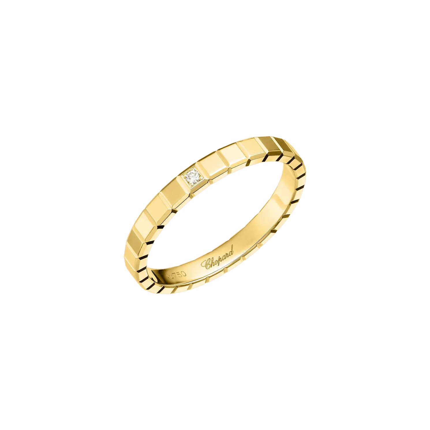 Yellow gold ring with a geometric square pattern and small diamond.
