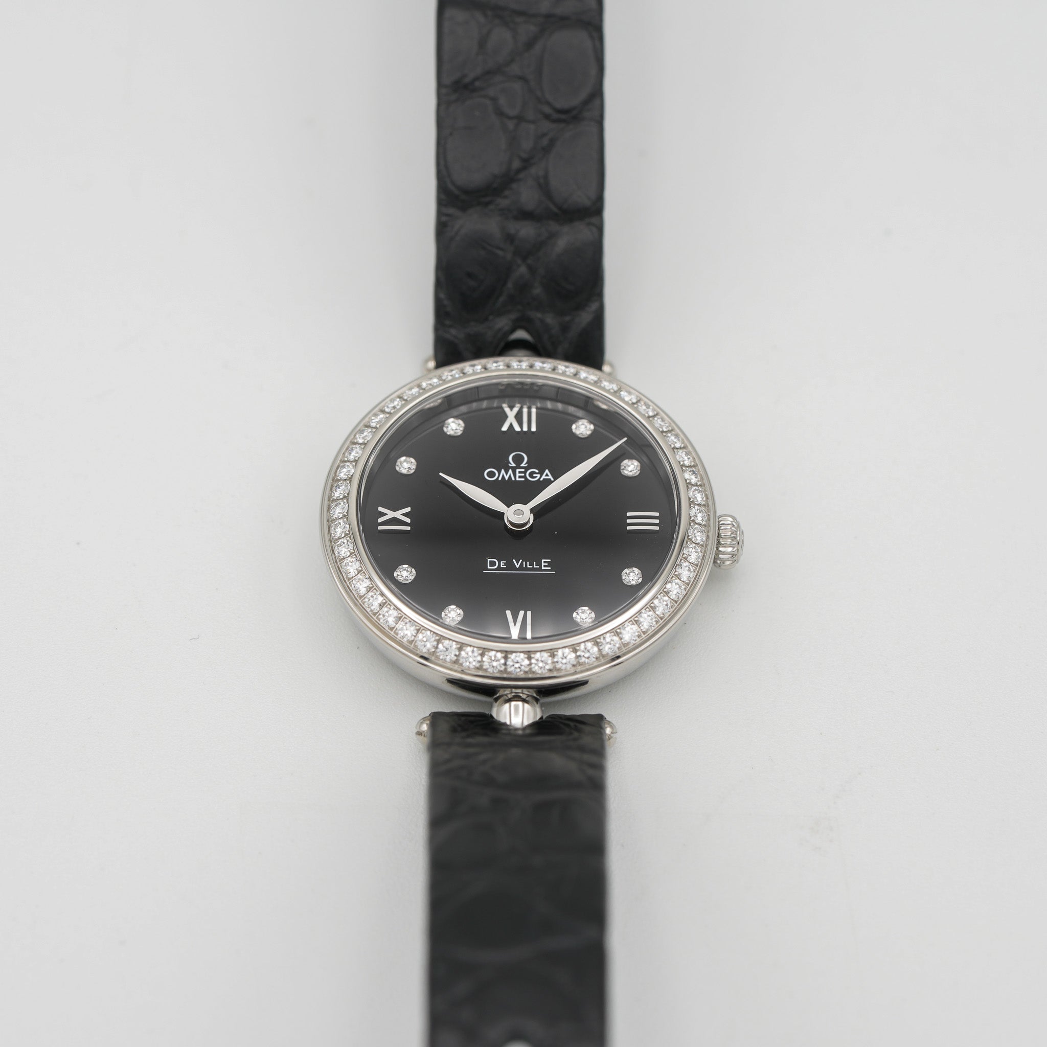 Omega 424.18.27.60.51.001 De Ville Prestige Dewdrop Quartz 27.4mm Watch dial flatlay