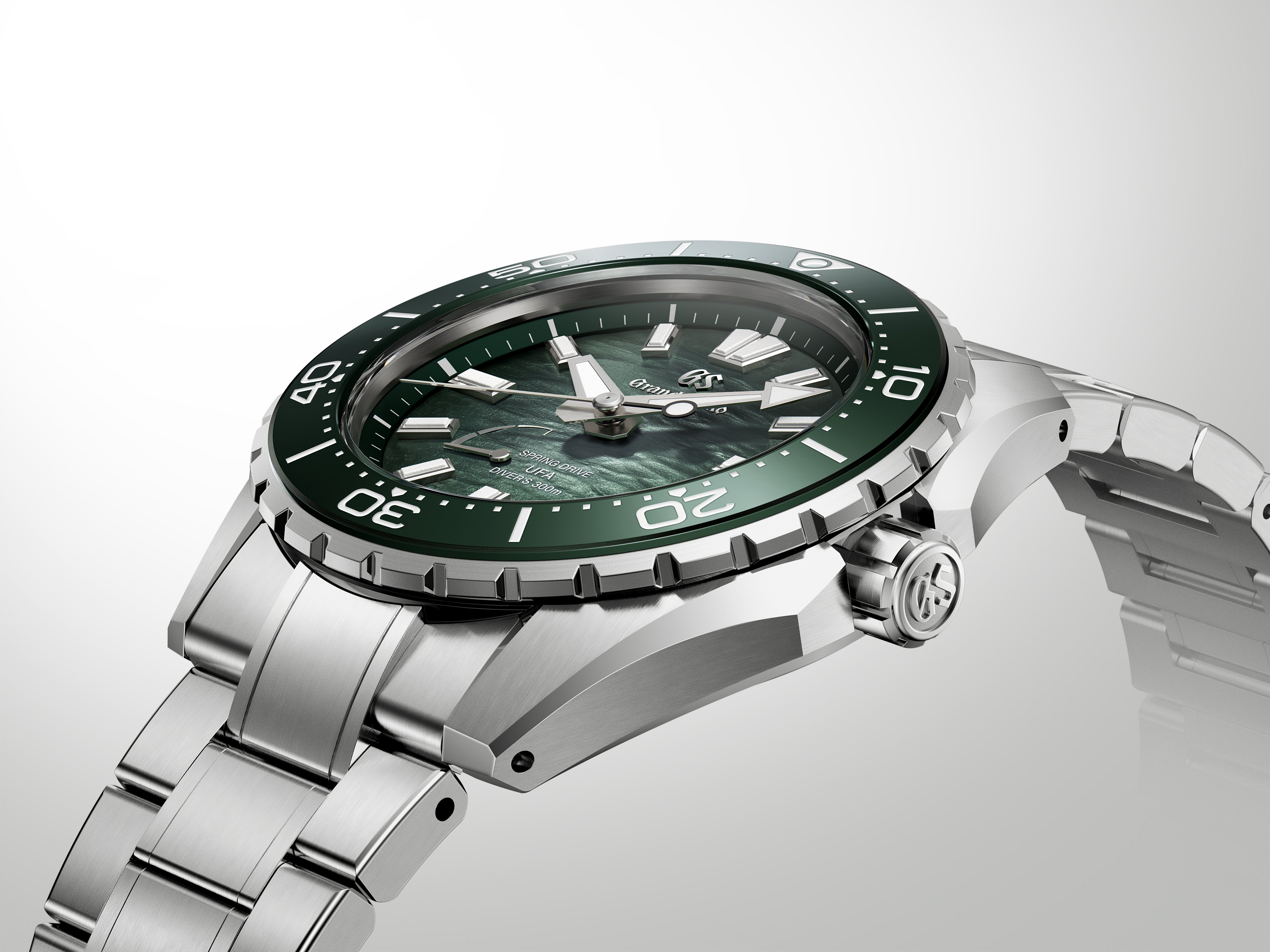 Side perspective highlighting the polished case finish and the integrated metal bracelet.