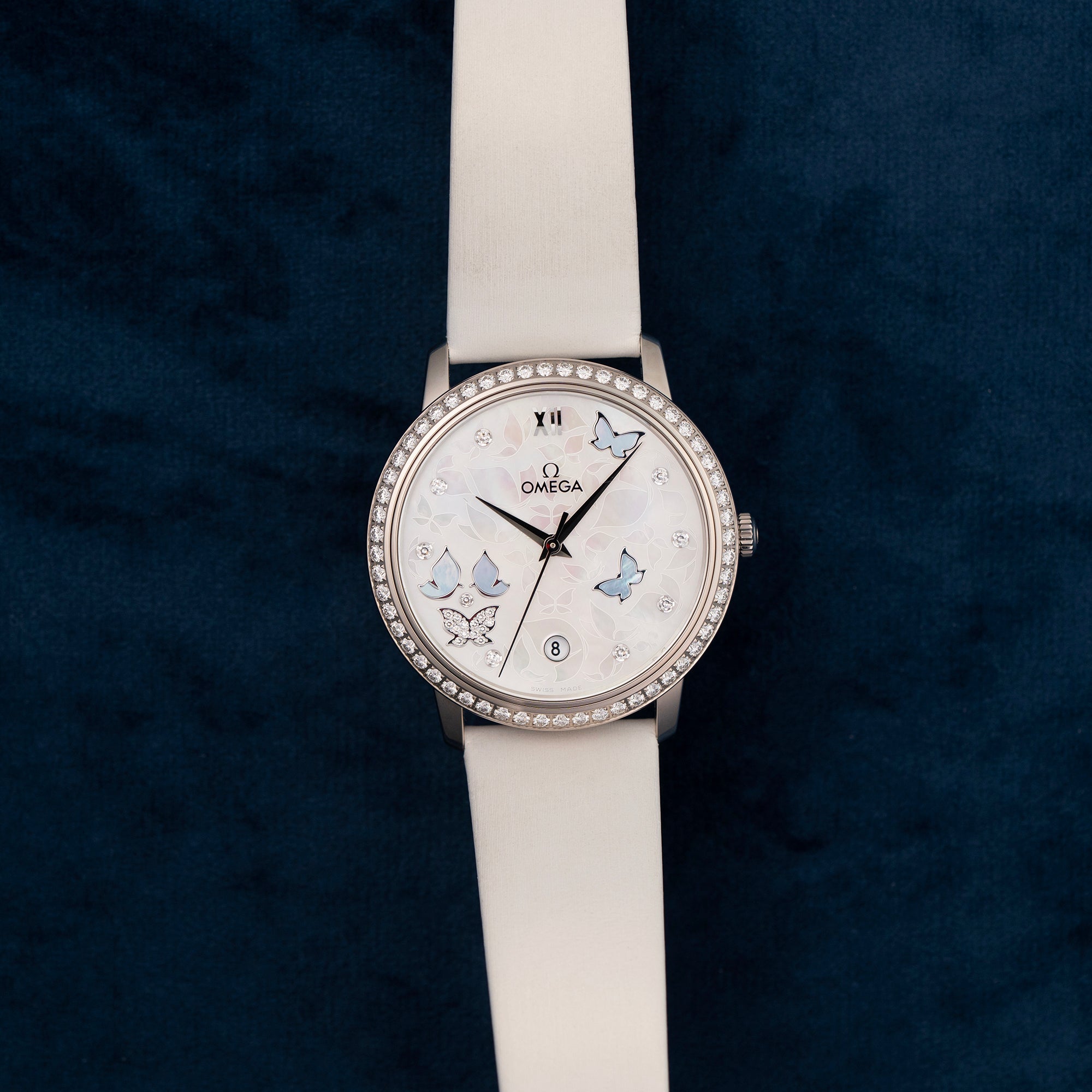 Omega DeVille Prestige Ladies Mother of Pearl Butterfly 42457372055002 dial