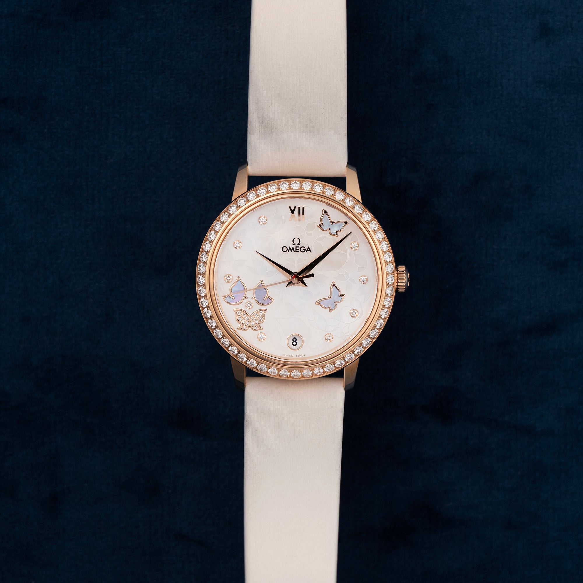 Omega DeVille Prestige Rose Gold Mother of Pearl Butterfly Dial with Diamonds 42457332055002 dial