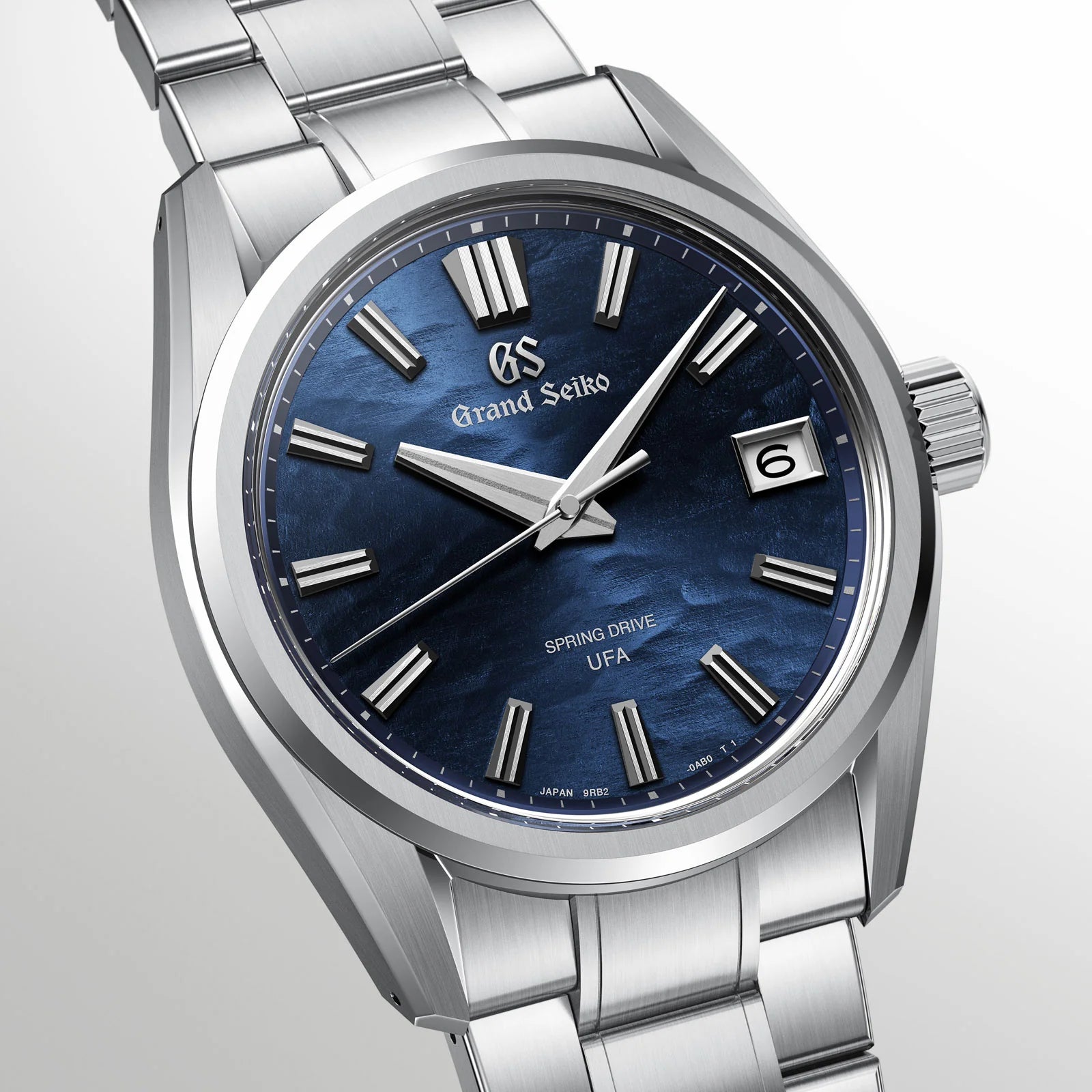 Angled view Grand Seiko Evolution 9 Collection Spring Drive U.F.A. 'Lake Suwa' 37mm SLGB013