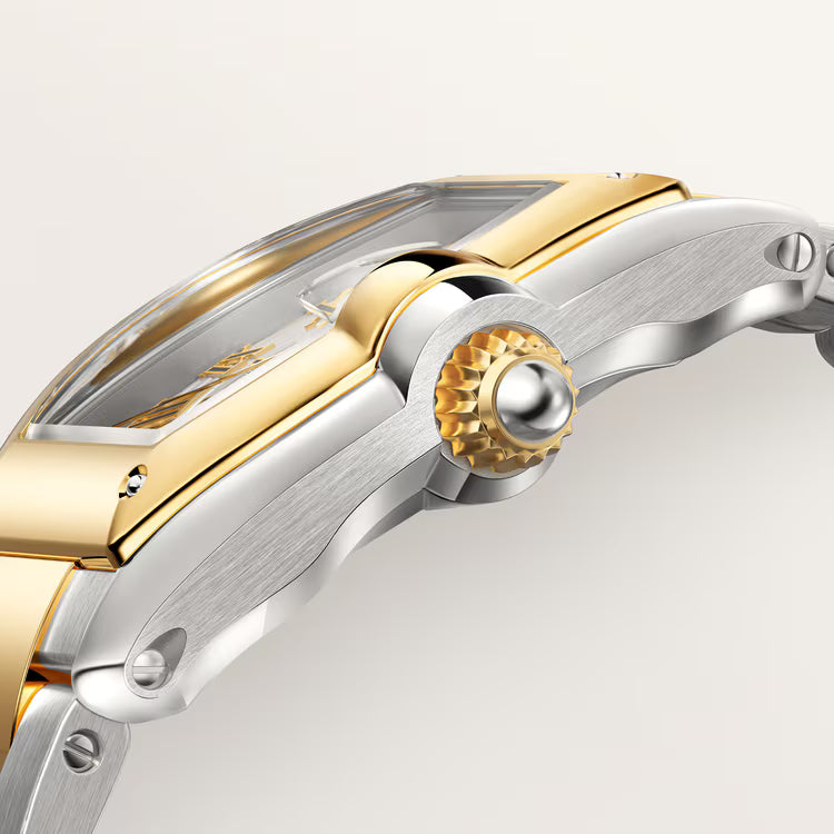 Side view highlighting the gold bezel and steel case with crown.
