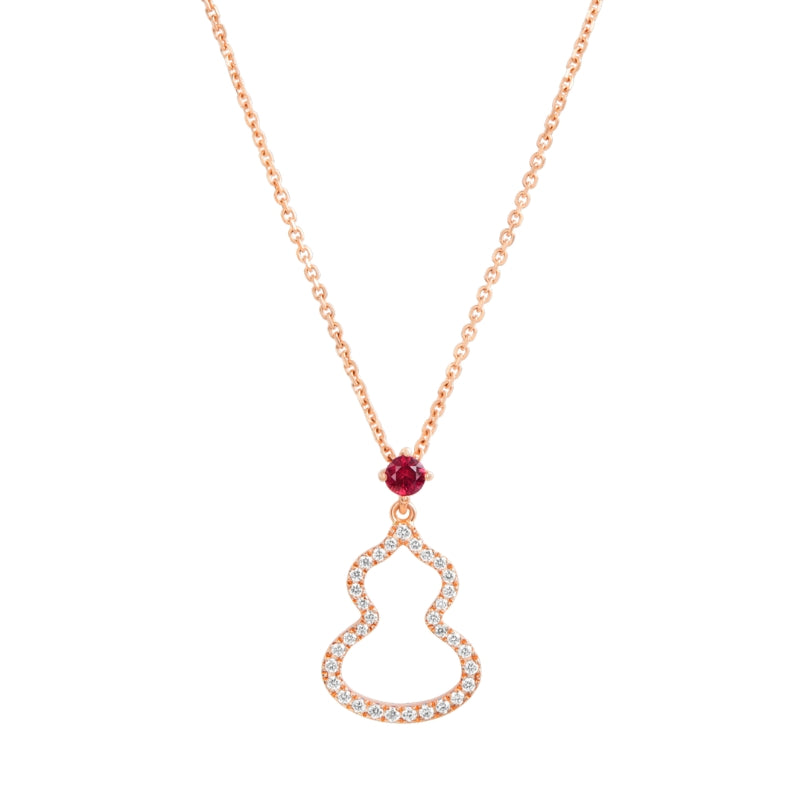 Front View Of Qeelin Wulu small necklace 18K rose gold set with a ruby and diamonds .