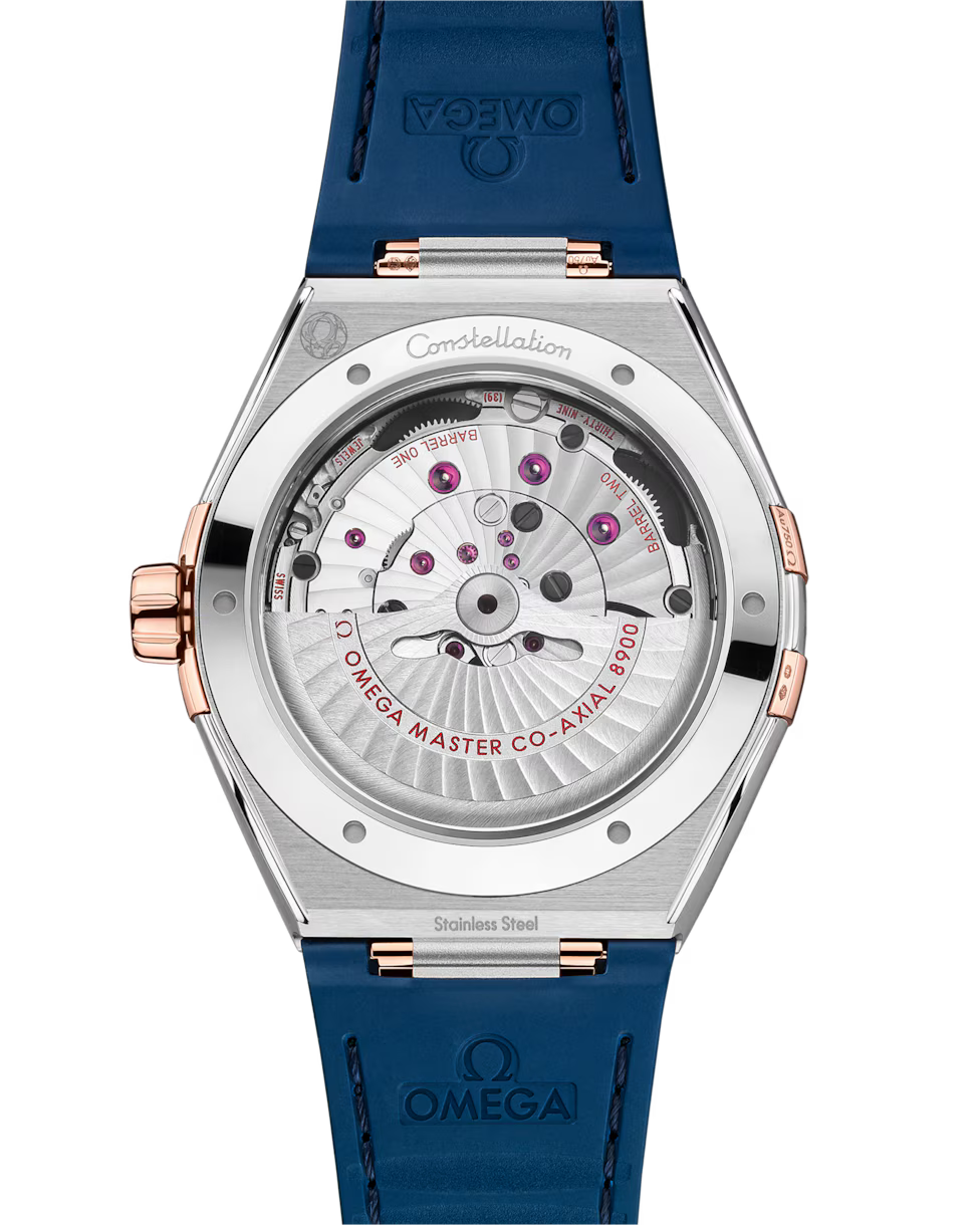 Transparent caseback showing the automatic watch movement.