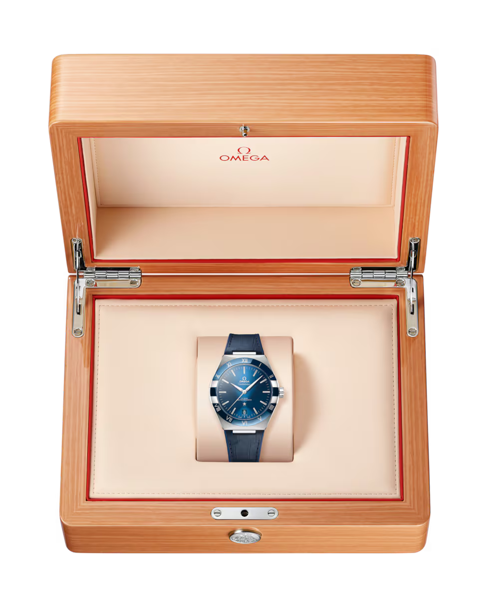 Omega Constellation watch in a wooden gift box.