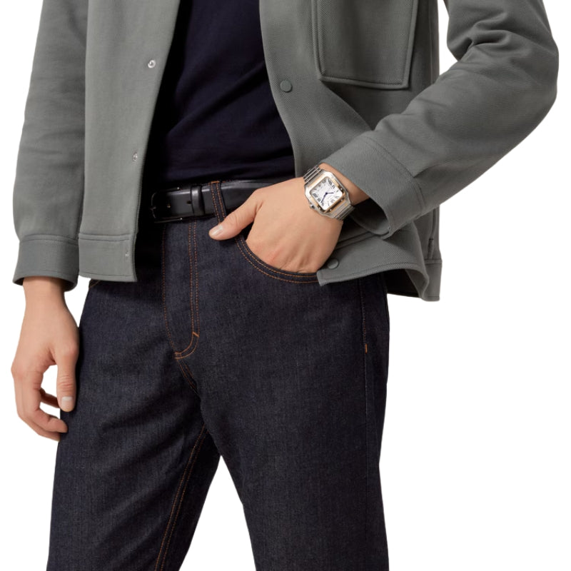 Man wearing a Cartier watch with casual attire.
