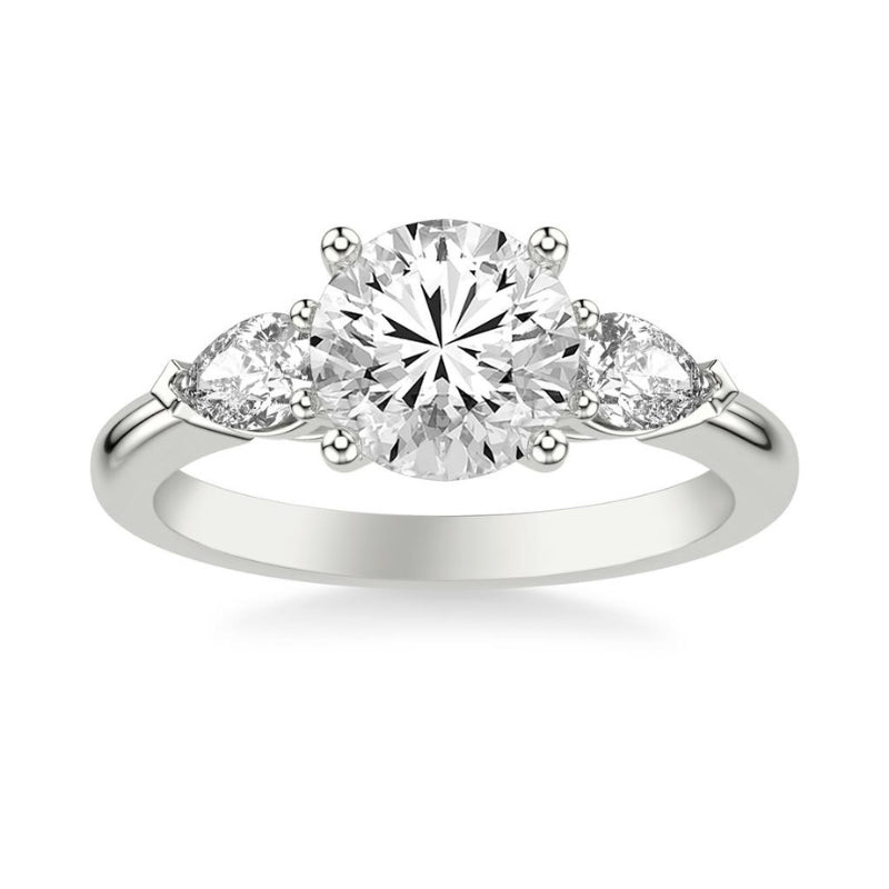 Front View Of Round Three-Stone Engagement Ring with 1/2 CTW Pear Sides.