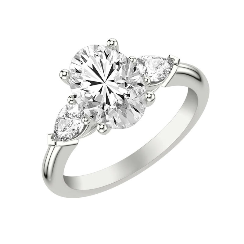 Tilted  View Of Oval Three-Stone Engagement Ring with 1/2 CTW Pear Sides.
