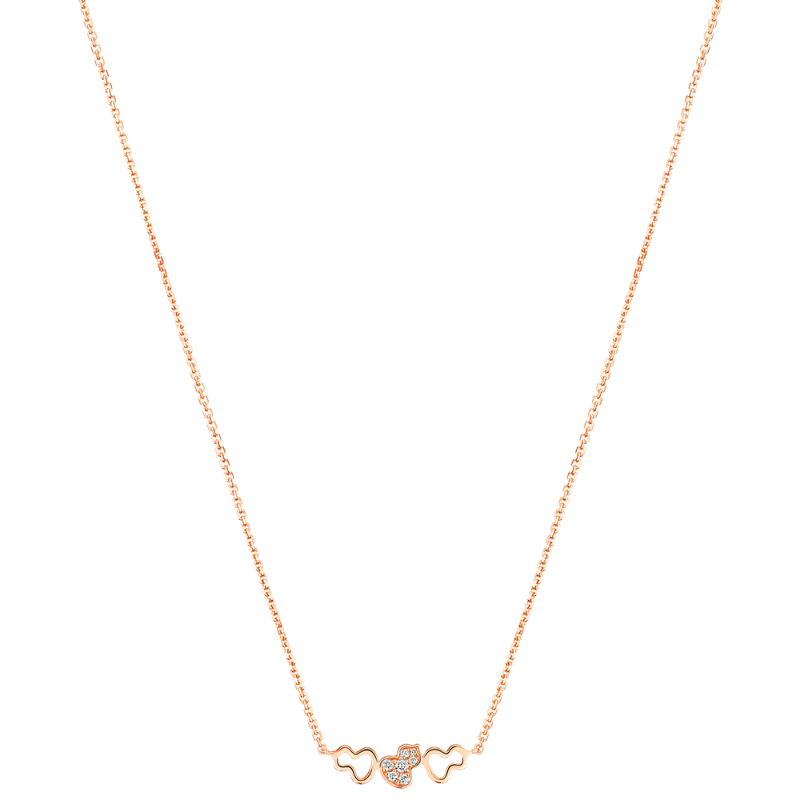 Close Up View Qeelin Wulu petite necklace in 18K rose gold set with diamonds.