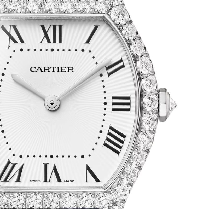 Dial view cartier watch with white dial.
