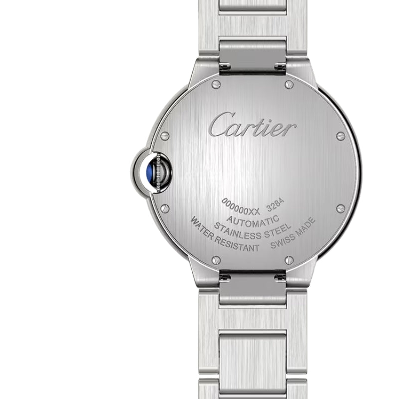 Close-up of metal watch back and serial number.