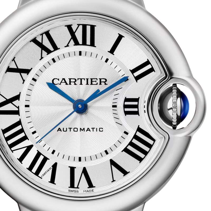 Macro shot of Cartier silver guilloche watch dial.