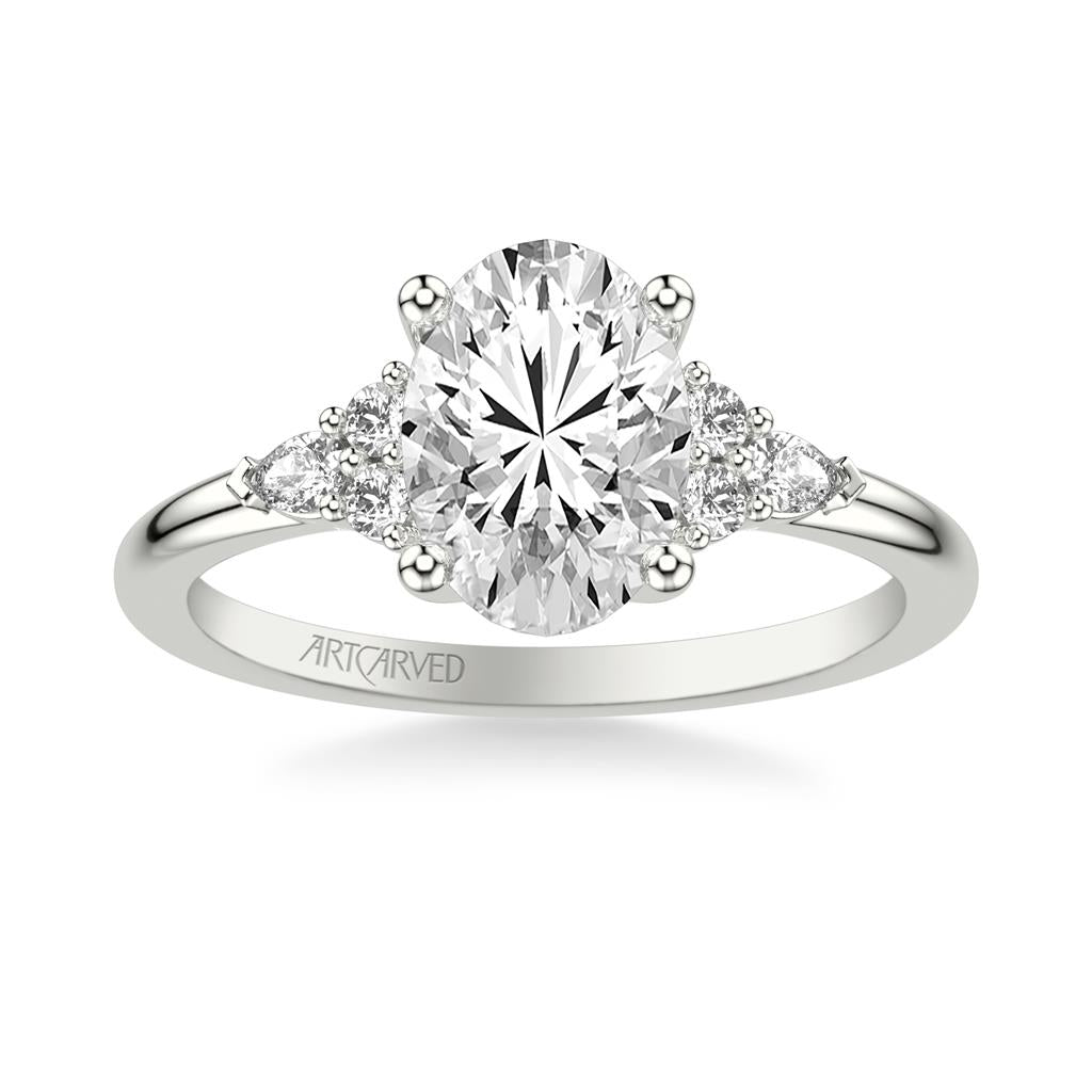 Classic Engagement Ring with a Cluster of Round and Pear Diamond Side Stones and Polished Shank