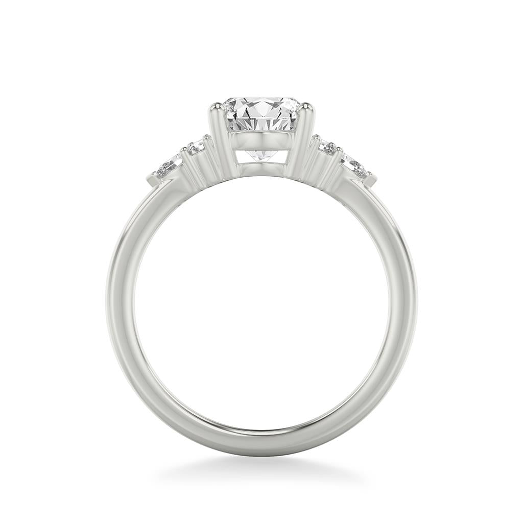 Side View Classic Engagement Ring with a Cluster of Round and Pear Diamond Side Stones and Polished Shank