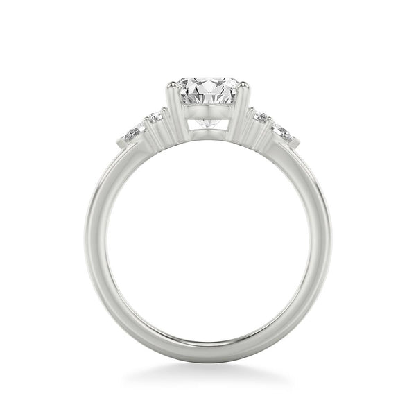 Side View Classic Engagement Ring with a Cluster of Round and Pear Diamond Side Stones and Polished Shank