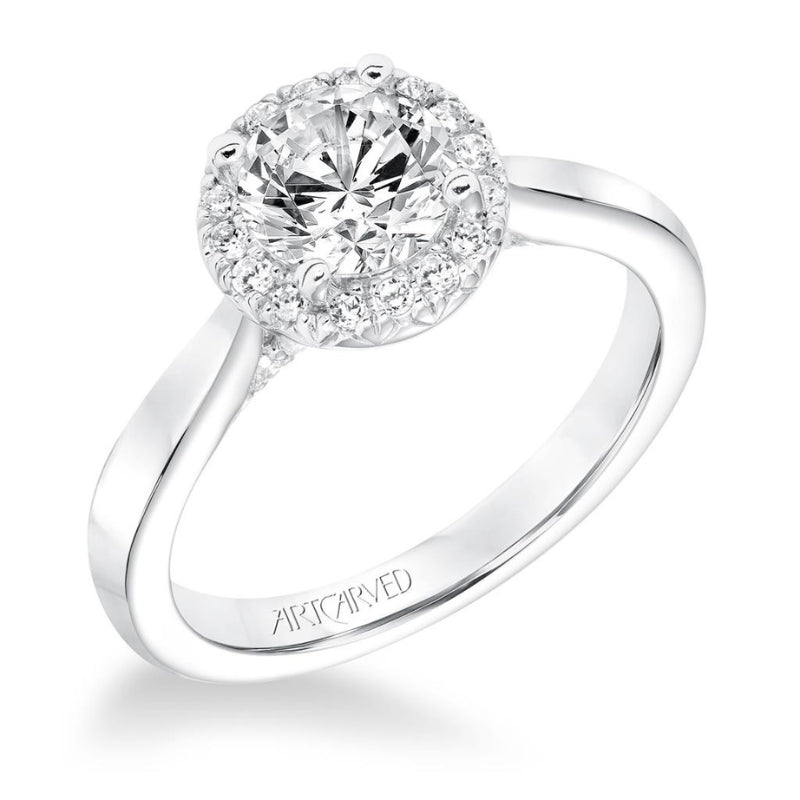 Tilted View Of Classic Diamond Halo Engagement ring.