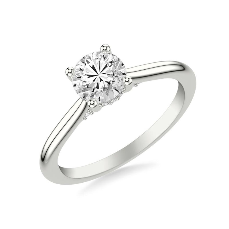Tilted View Of Emerald Classic Solitaire Engagement Ring with Hidden Diamond Halo.