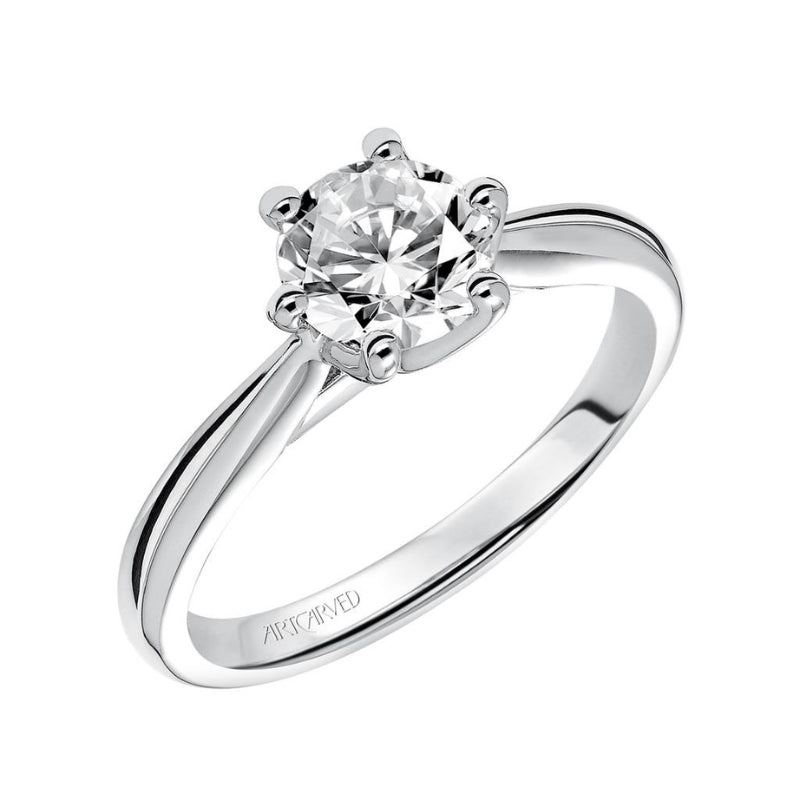 Tilted View Of Classic Solitaire Engagement Ring.