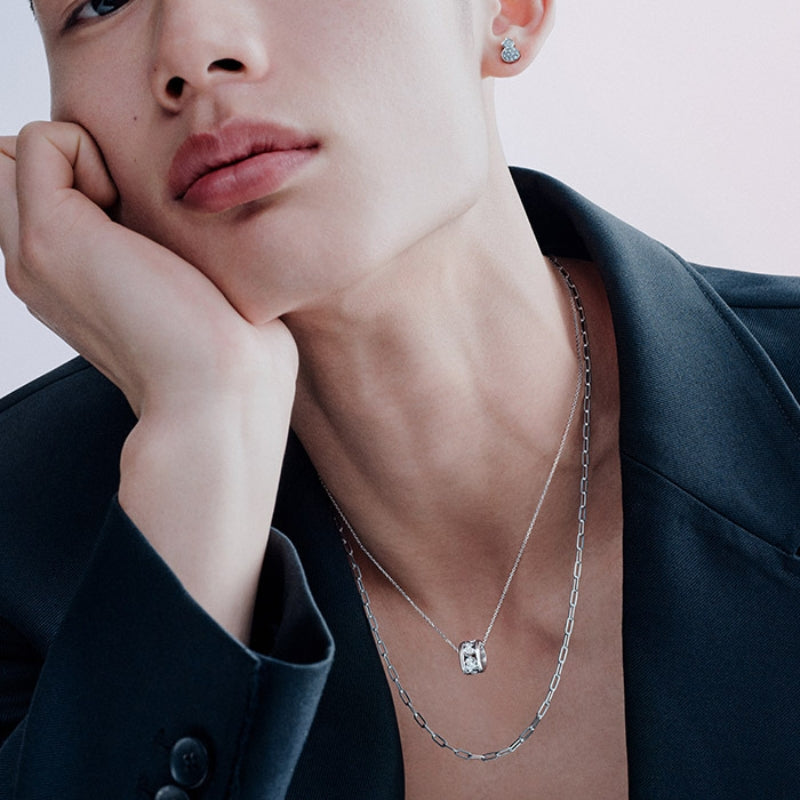 Women Wearing Qeelin Small Wulu necklace in 18K white gold with diamonds.
