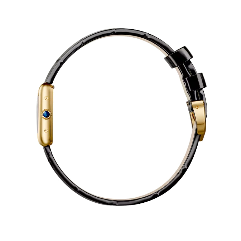 Side profile view of a gold Cartier watch.