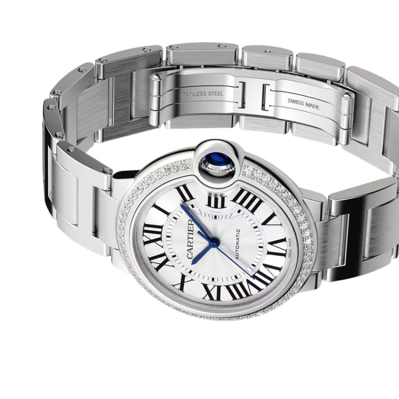 Angled view of watch face and open bracelet.