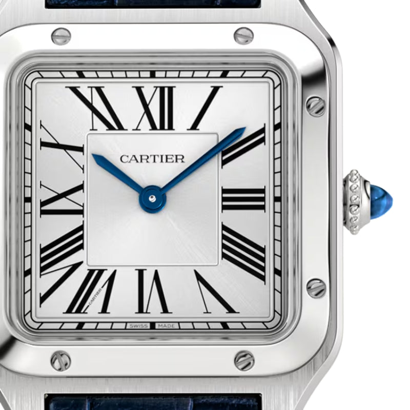 Detailed close up of silver square watch dial.