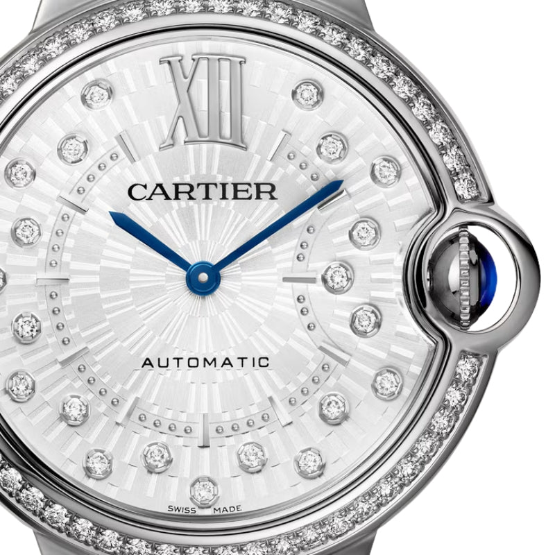 Close up view of diamond studded watch face.