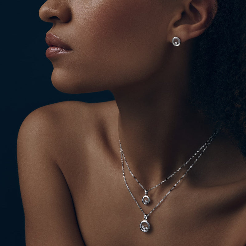 Model wearing Happy Diamonds Icons white gold pendant
