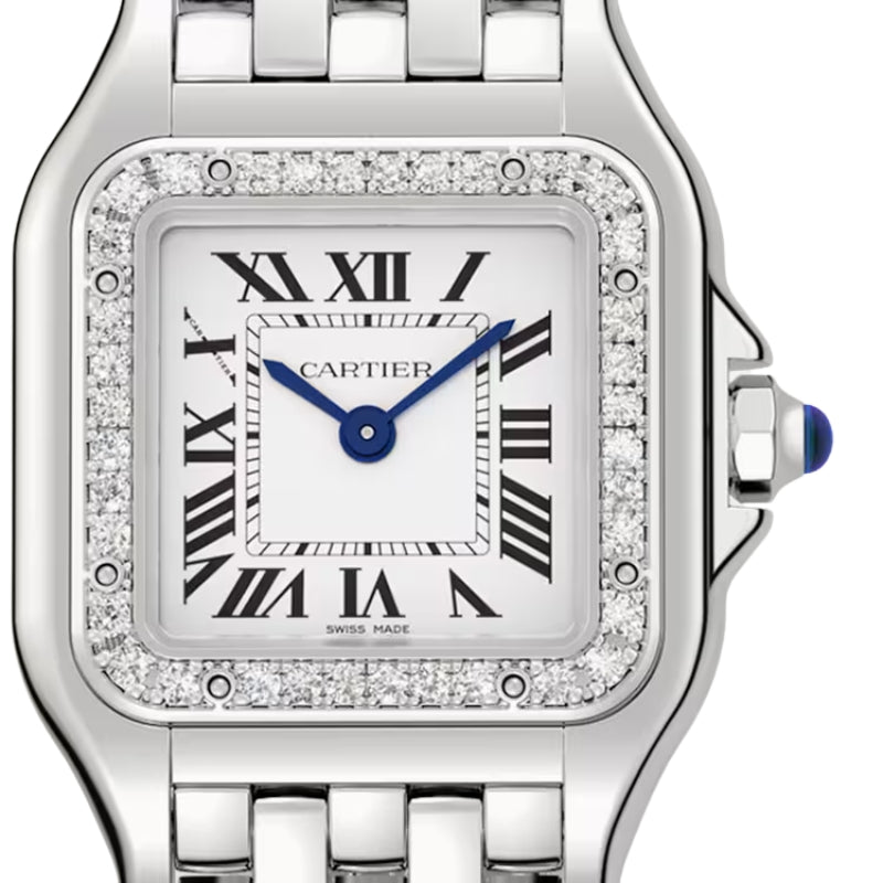 Close up of diamond bezel on Cartier watch.