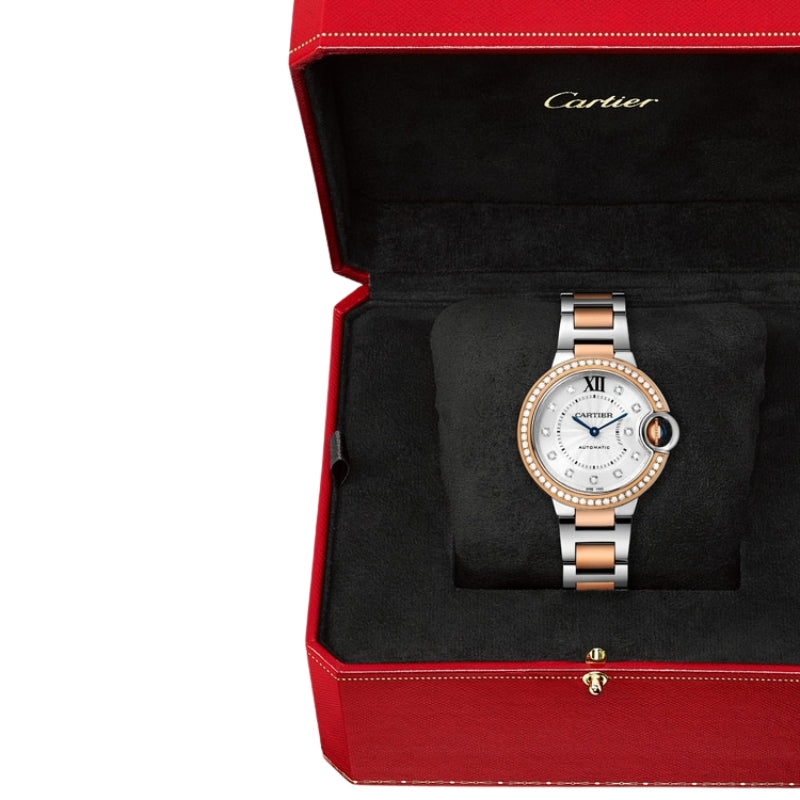 Cartier watch in signature red luxury display box.