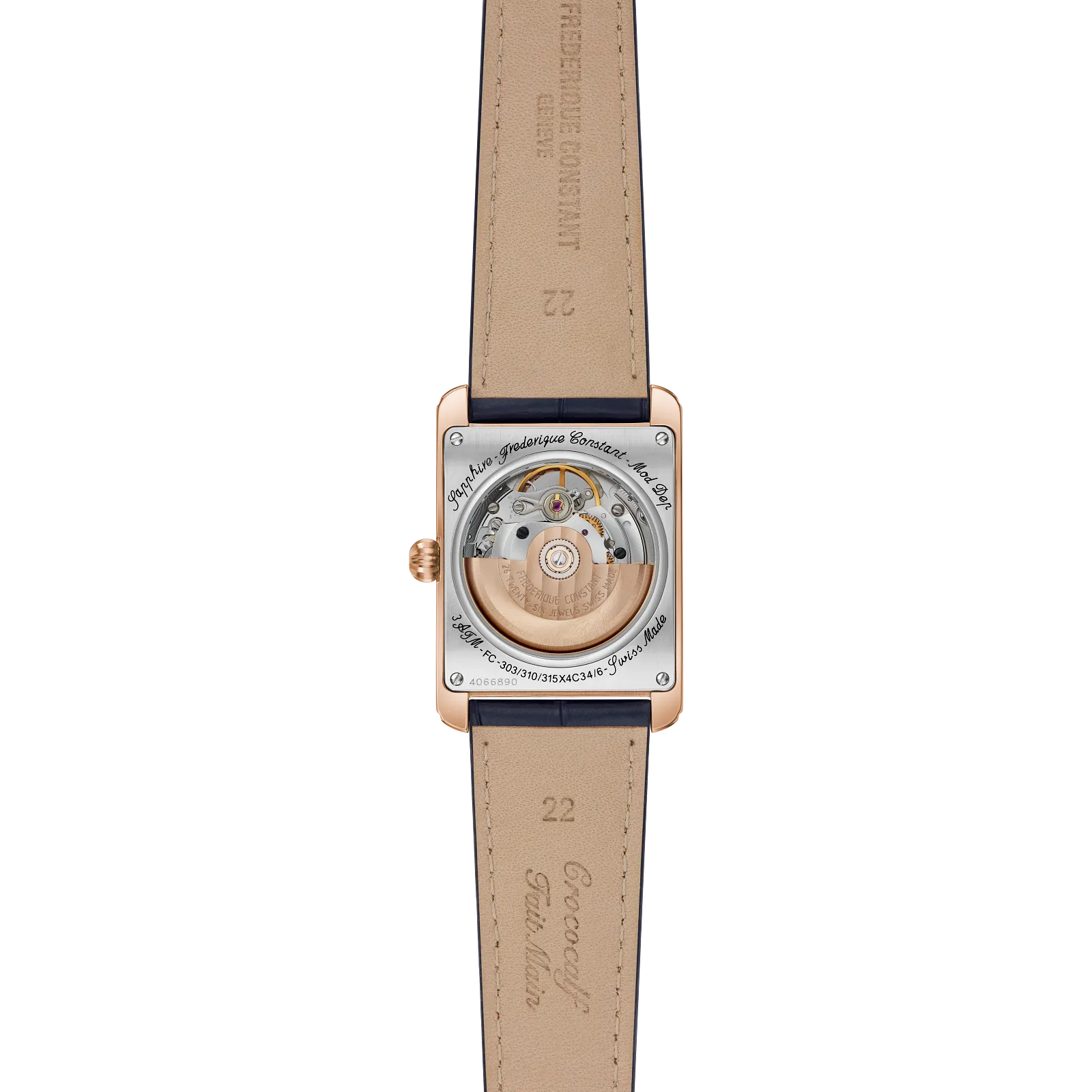Small rectangular exhibition caseback showing the movement with a tan leather strap lining.