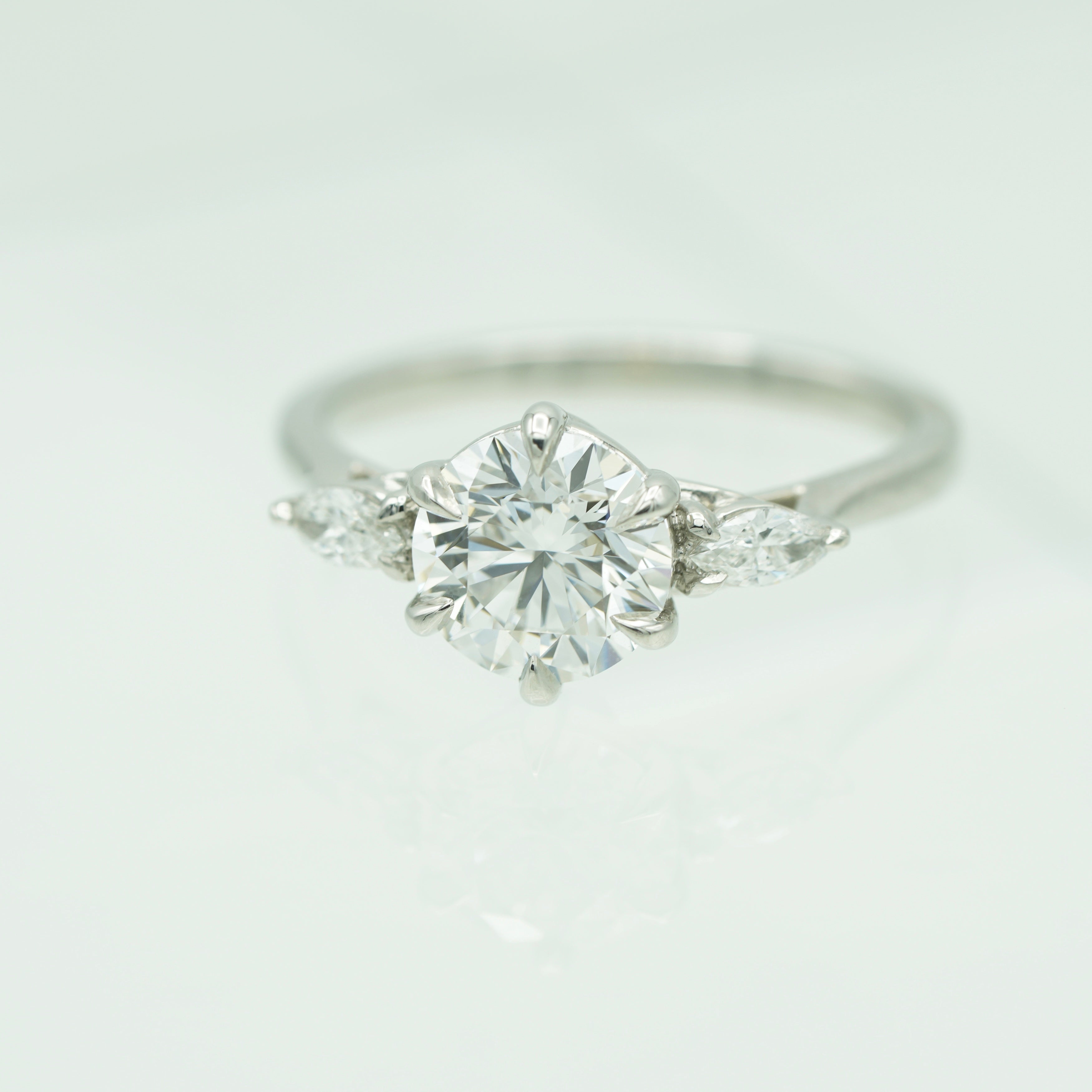 Round and Marquise Side Stone Setting Diamond Ring