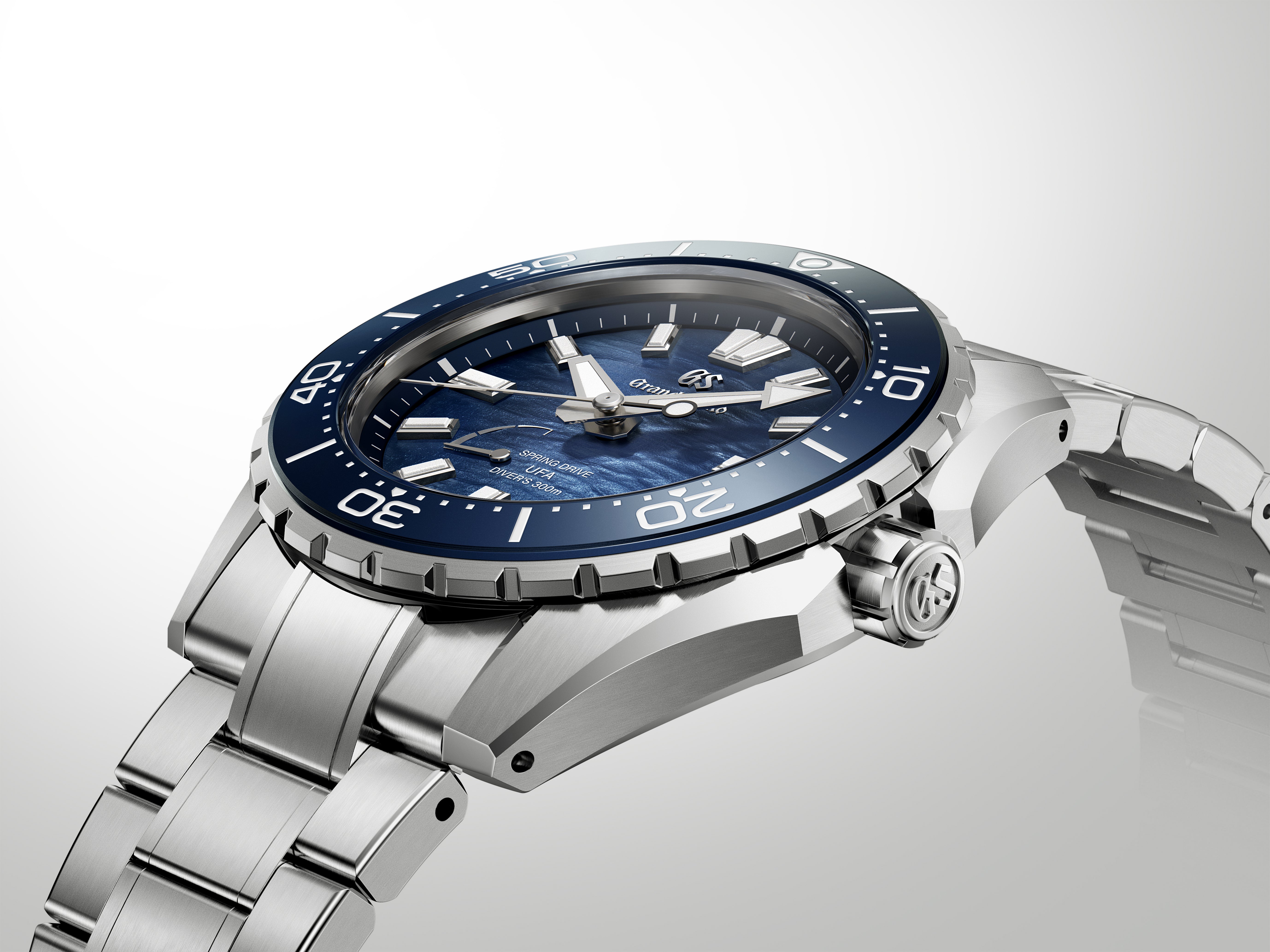 Side perspective highlighting the polished bezel and the slim stainless steel case.