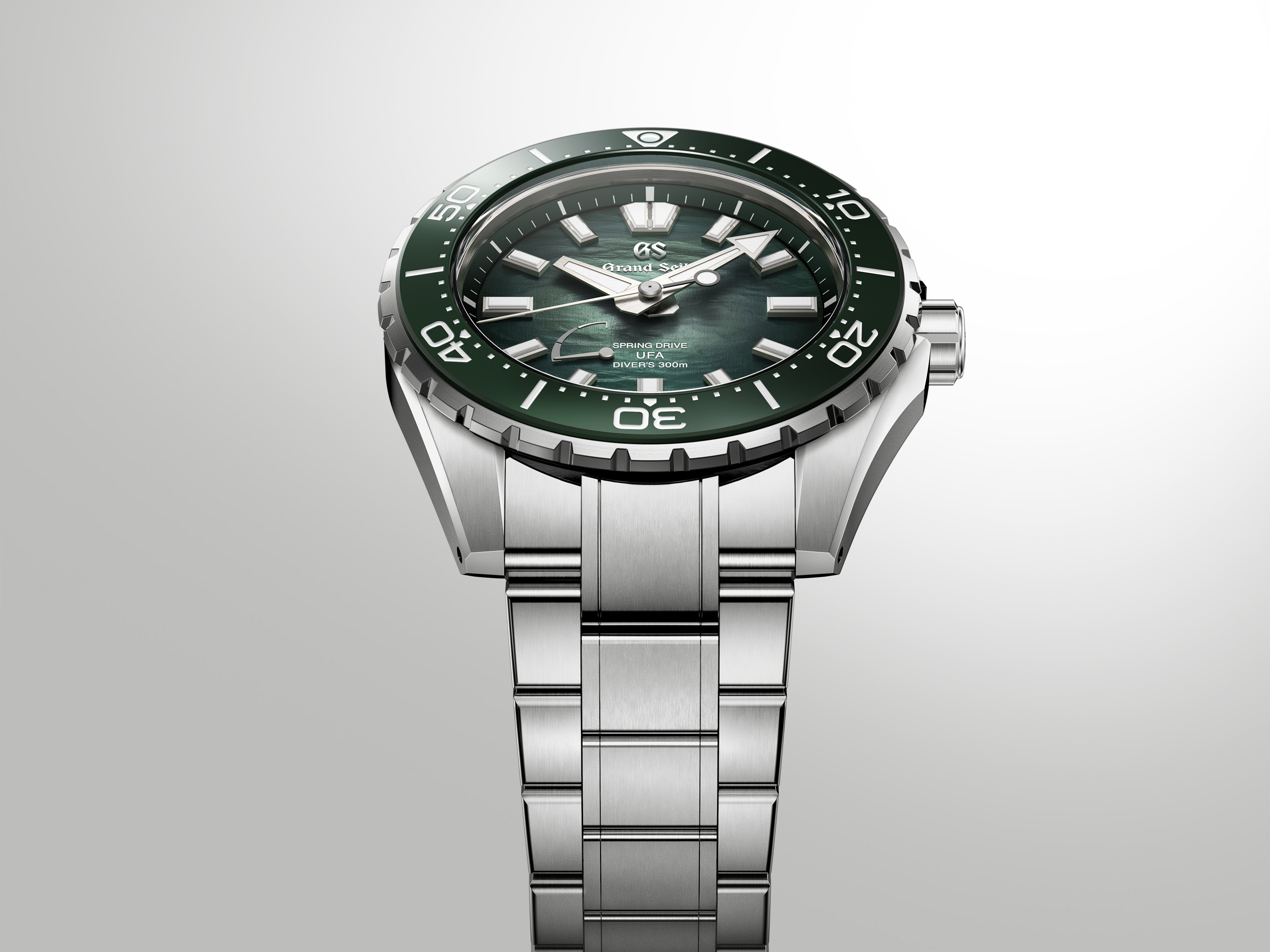 Close-up of the watch bracelet clasp featuring the engraved Grand Seiko logo.