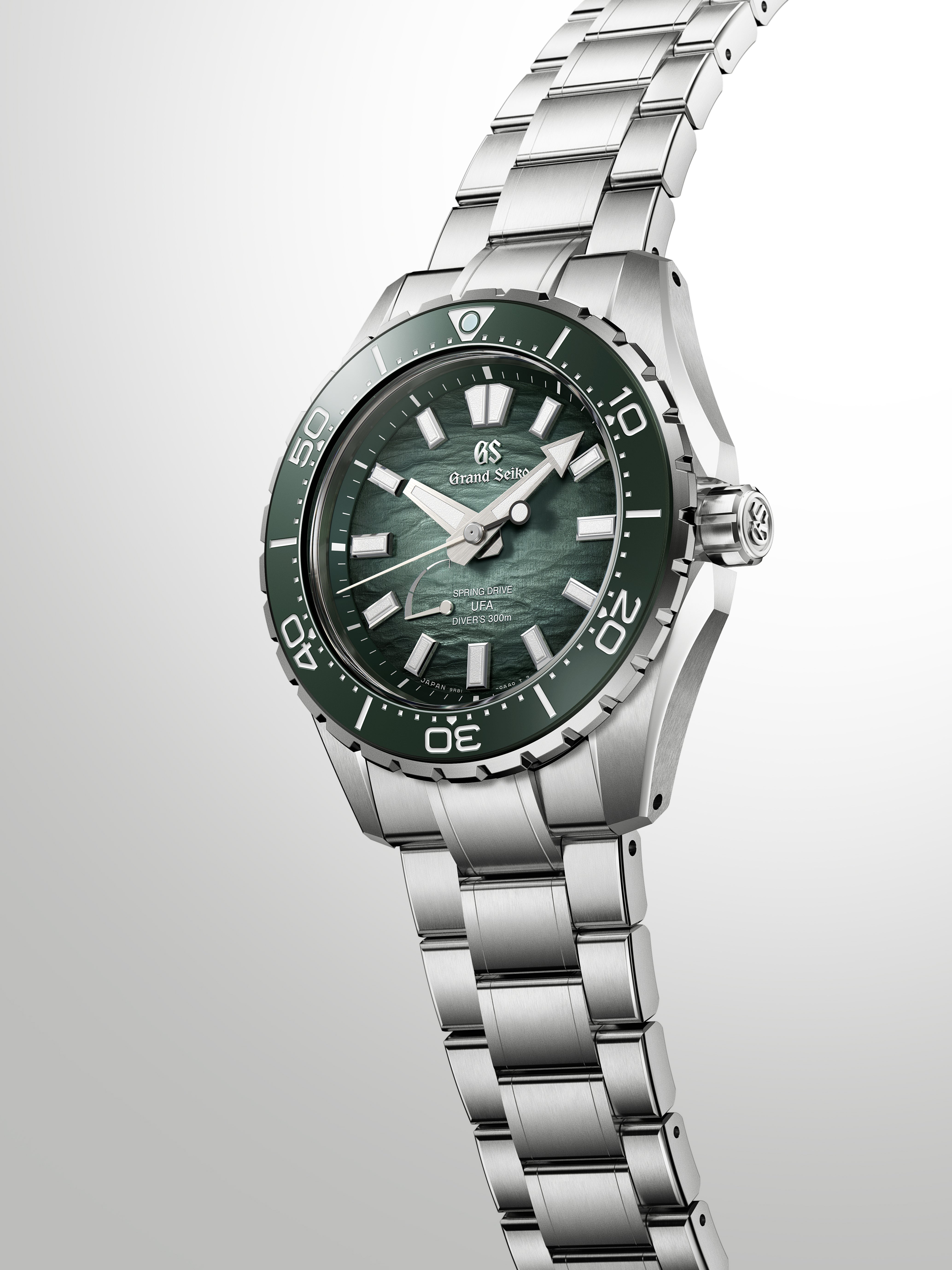 High-fashion studio shot of the watch with dramatic lighting and soft shadows.