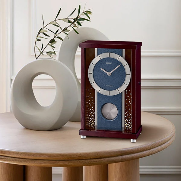 Seiko Dark Brown/Blue Wood with Foil 18 Melodies Musical Mantel Clock QXW251BLH lifestyle shot 2