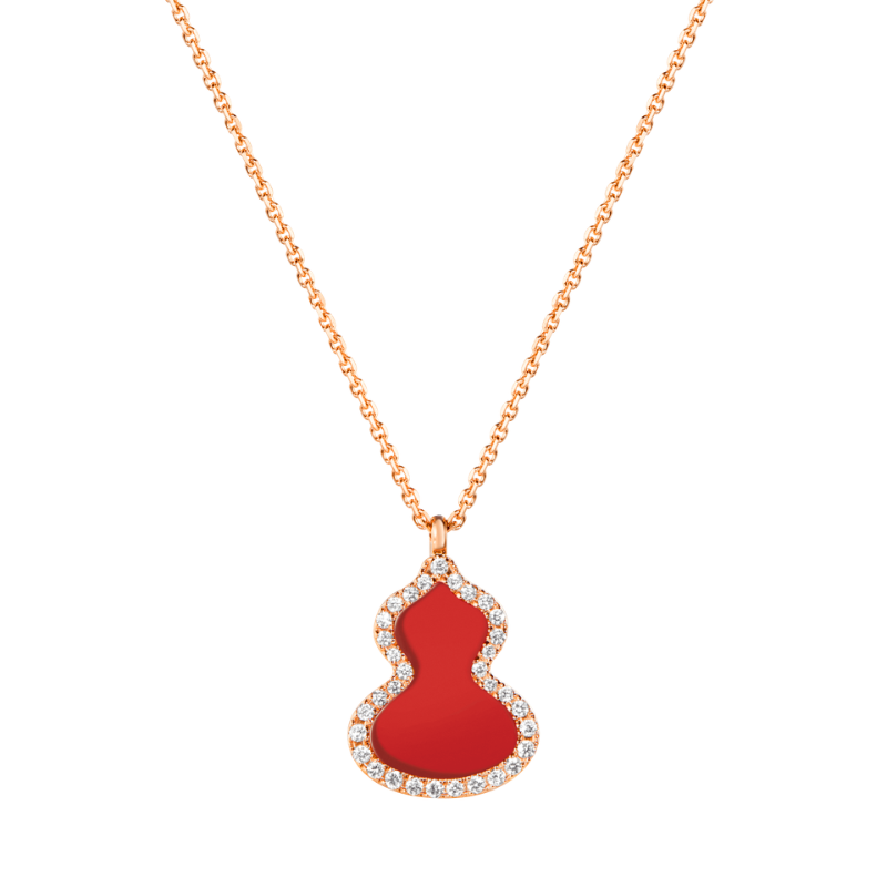 Close Up View Qeelin Wulu small necklace in 18K rose gold set with red and diamonds.